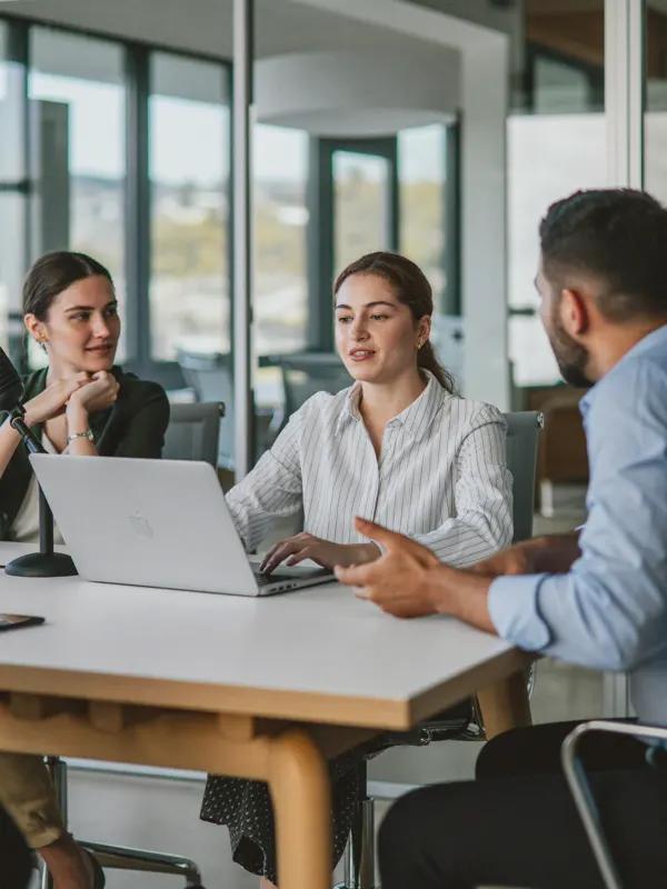 Three colleagues in discussion